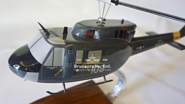 Model of UH-1N Twin Huey US NAVY 103 Aircraft with detailed craftsmanship.